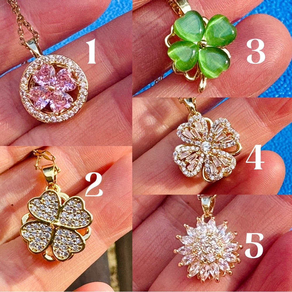 Spinning four leaf clover necklace